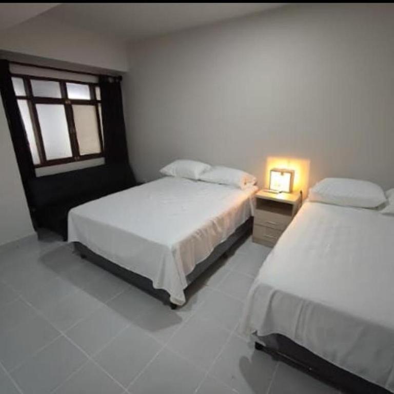 Amaca Hostal - Habitación cuádruple - 23