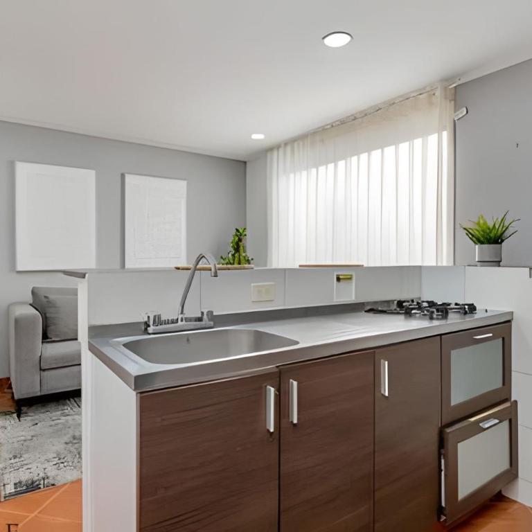 Aria Living 500 - Elegancia con Terraza Exclusiva - Apartment - 13