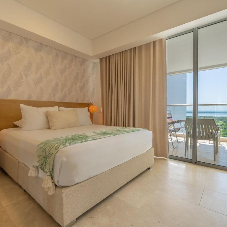 CB1444 Suite Hermosa Frente a Cienaga-Amanecer - Suite con cama grande - 1