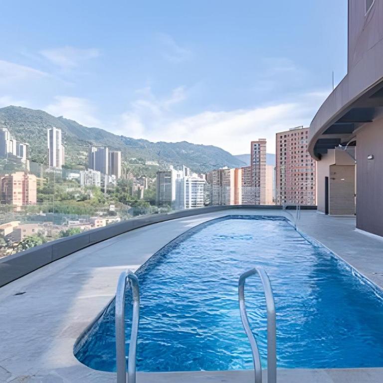 Class Suites 202 - Colorido con piscina y gym - Apartment - 15