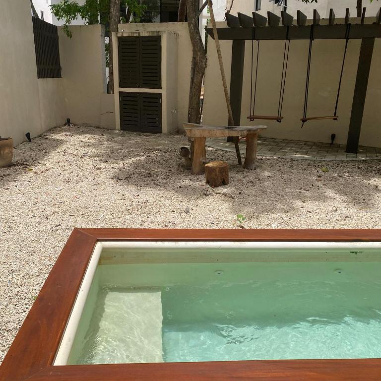 Condominio Talulah Living Tulum - Apartamento de 2 dormitorios con vistas a la piscina - 1