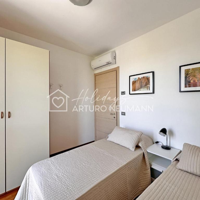 229 - Appartamento trilocale al primo piano con ampio terrazzo - al residence Adamo ed Eva con piscina e campo da calcetto, climatizzato - SPIAGGIA INCLUSA AL WHITE BEACH CLUB - Two-Bedroom Apartment - 9