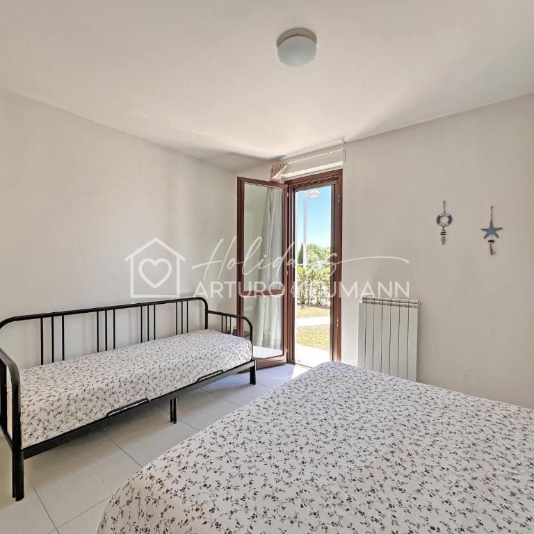 640 - RESIDENCE ADAMO & EVA - Dolce relax, stupendo bilo al piano terra con bellissimo giardino , 2 piscine - Apartment with Garden View - 8