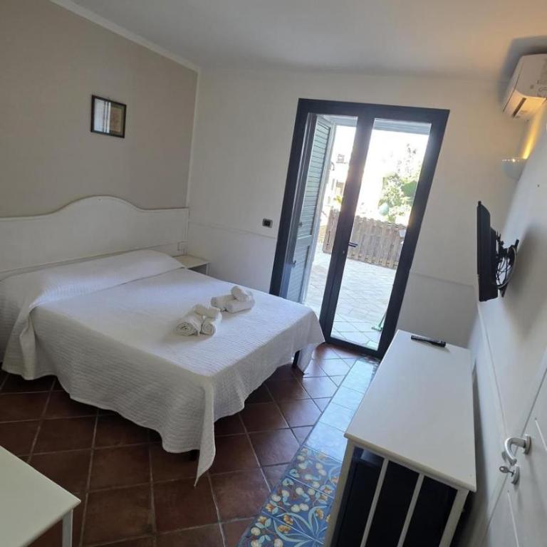 Sirami Apartments - Camera Matrimoniale con Patio - 36