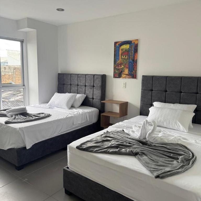 Hotel San Miguel src - Habitación Doble Deluxe - 2 camas dobles - 2