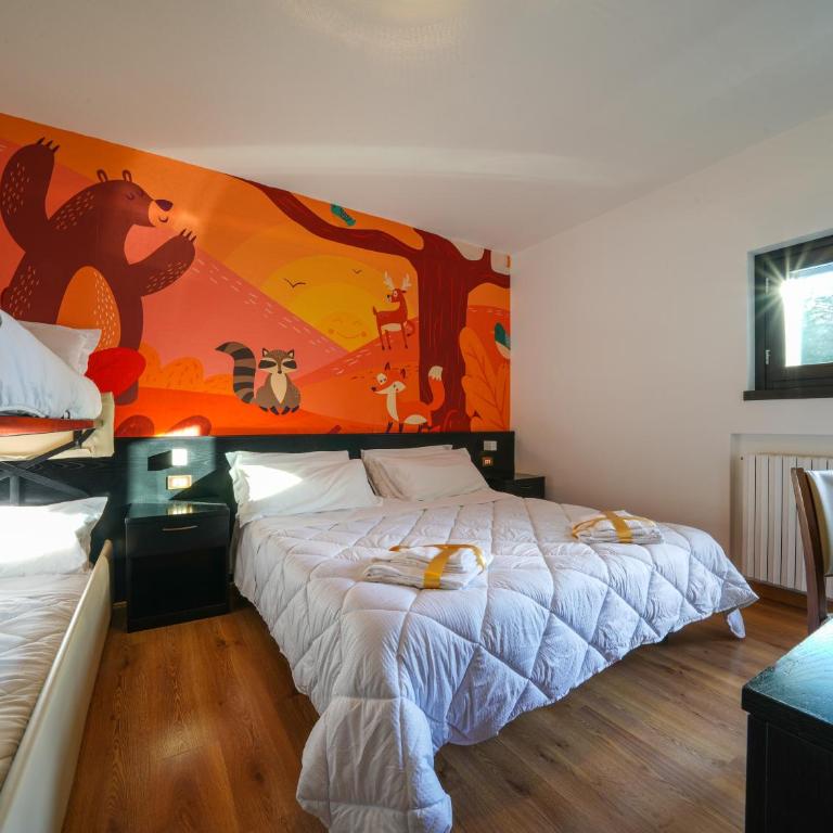 Hotel Arlecchino - Dada Hotels - Camera Quadrupla - 1