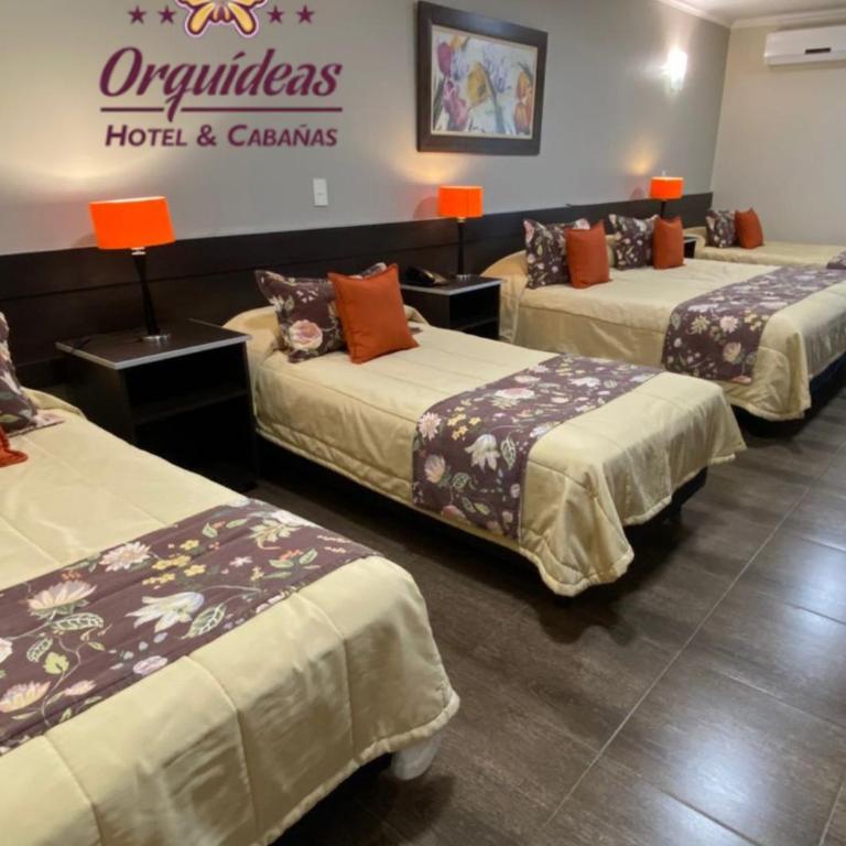 Orquideas Hotel & Cabañas - Habitación Familiar con vistas al jardín - 1