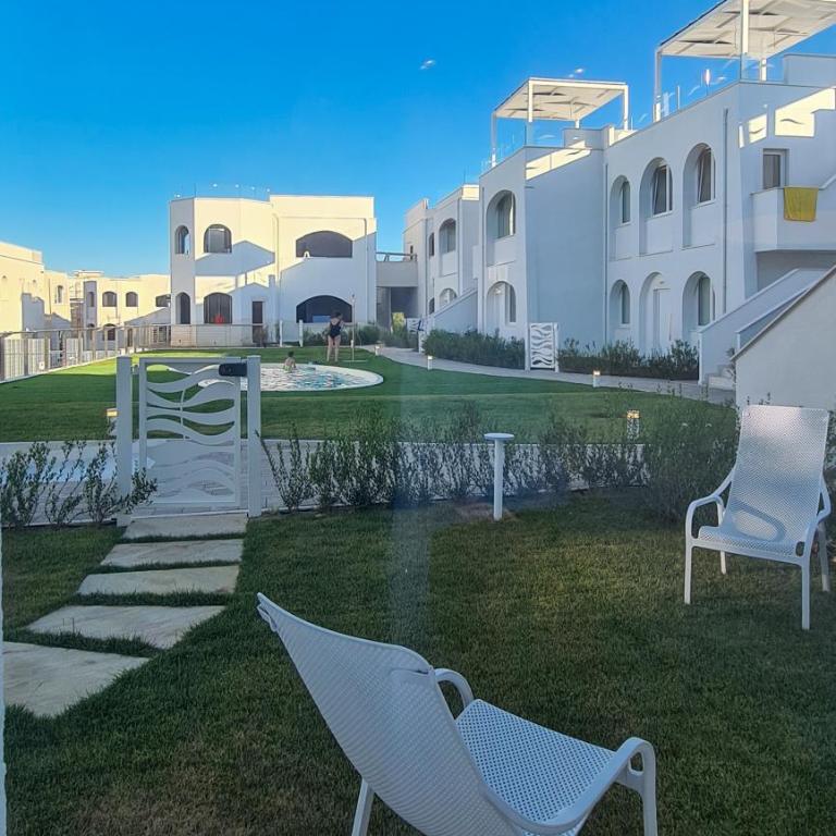 White Oasis - Piscina e Ombrellone in spiaggia seconda fila incluso - Appartamento con 2 Camere da Letto - 24