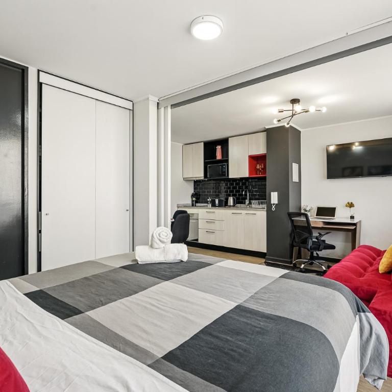 U310 - A pasos del Movistar Arena - 1dorm en Santiago - Wifi- Check in autonomo - Seguridad - Two-Bedroom Apartment - 5