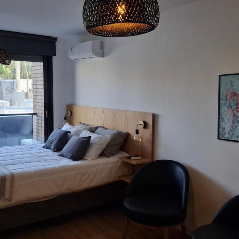 Aqua - Comfortable and bright, across from the mall - One-Bedroom Apartment - 1
