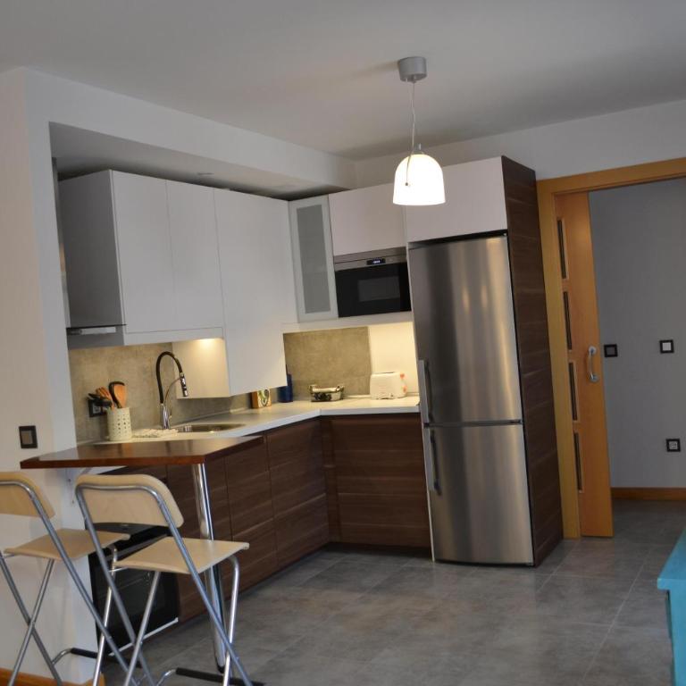 Apartamentos Suites&Homes - Apartamento Superior de 2 dormitorios con patio - Calle Gibraltar, 18 - 5