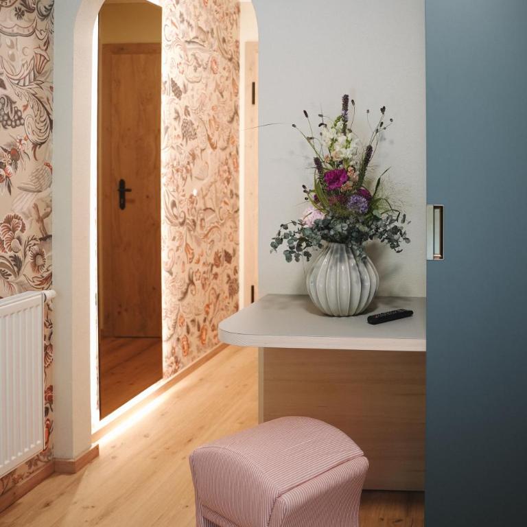 Alpenschlössl Boutique Appartements & Rooms - Deluxe Doppelzimmer mit Balkon - 7