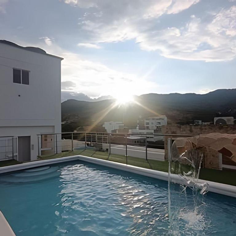Piscina, jacuzzi en la flora Cali - Estudio - 17