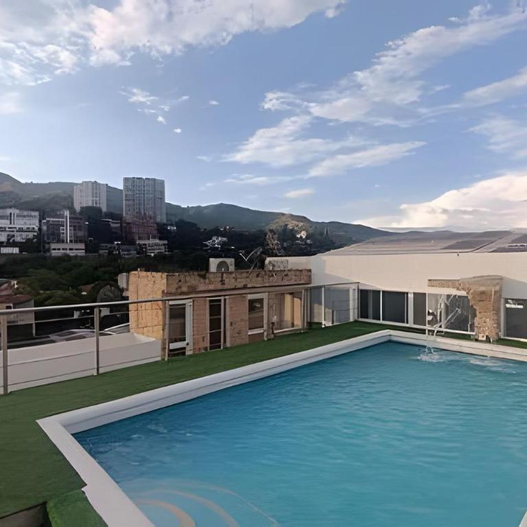 Piscina, jacuzzi en la flora Cali - Estudio - 20