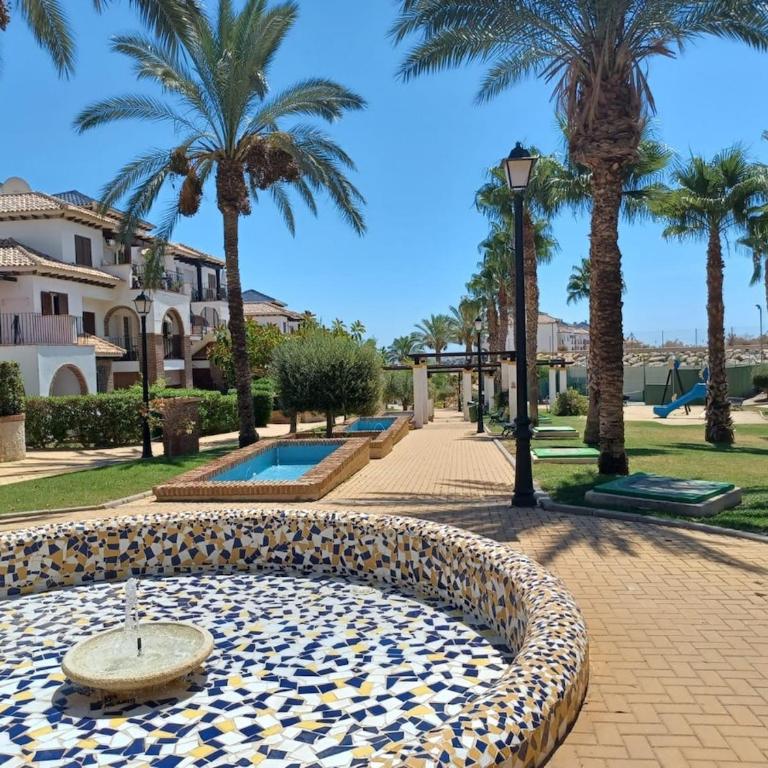 Precioso apartamento con jardín privado en urbanización con spa - Apartamento de 2 dormitorios - 30