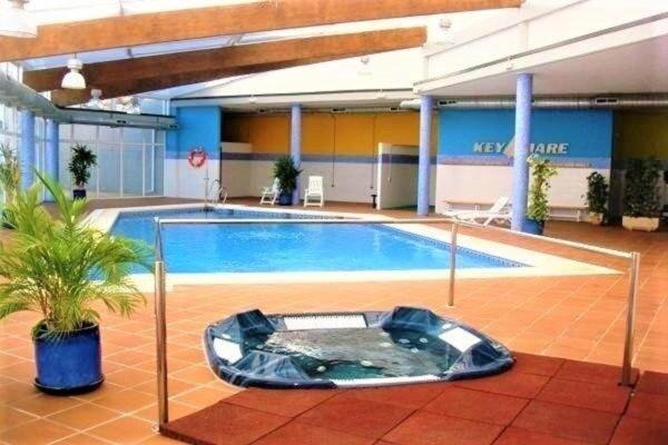 Precioso apartamento con jardín privado en urbanización con spa - Apartamento de 2 dormitorios - 36