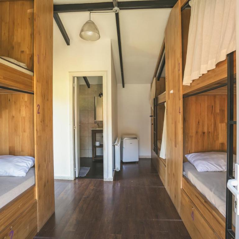INDÓMITO HOSTEL - Cama en habitación compartida mixta de 6 camas - 1