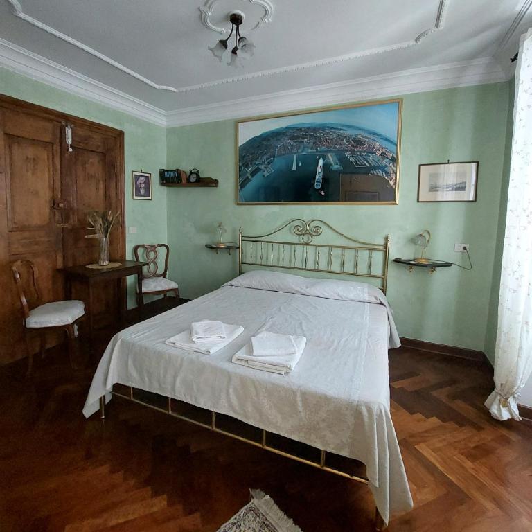 Affittacamere Rilke - Camera Tripla con Bagno in Comune - 1