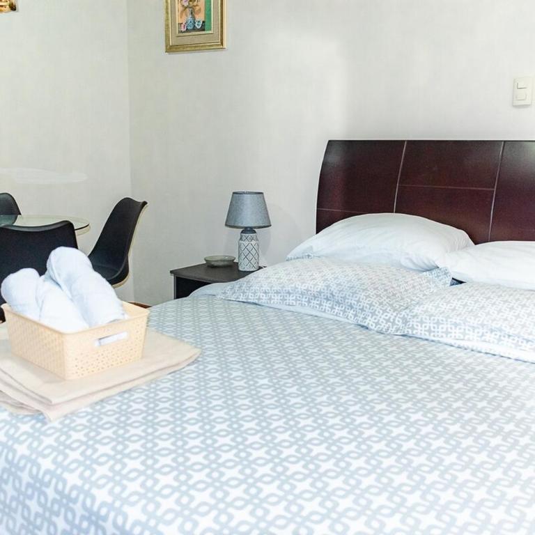 Suite on second floor in residential area with excellent location - One-Bedroom Apartment - 1