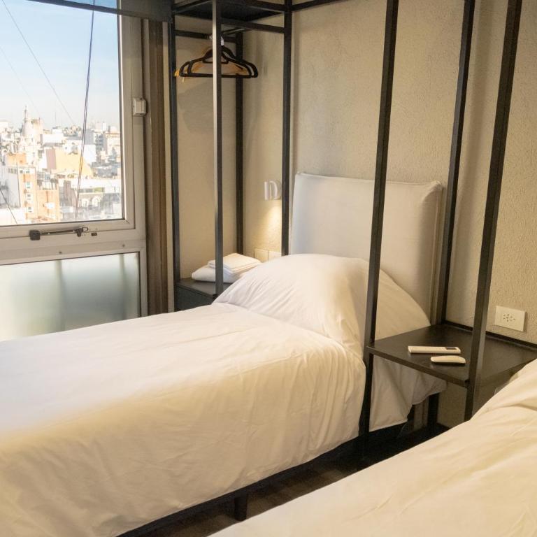 Comodidad y belleza, seguridad 24hs, céntrico, cochera, zona Galerías Pacífico y Obelisco - Habitación Doble Familiar - 16
