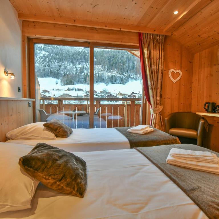 Hotel les Flocons - Doppel-/Zweibettzimmer mit Bergblick - 10