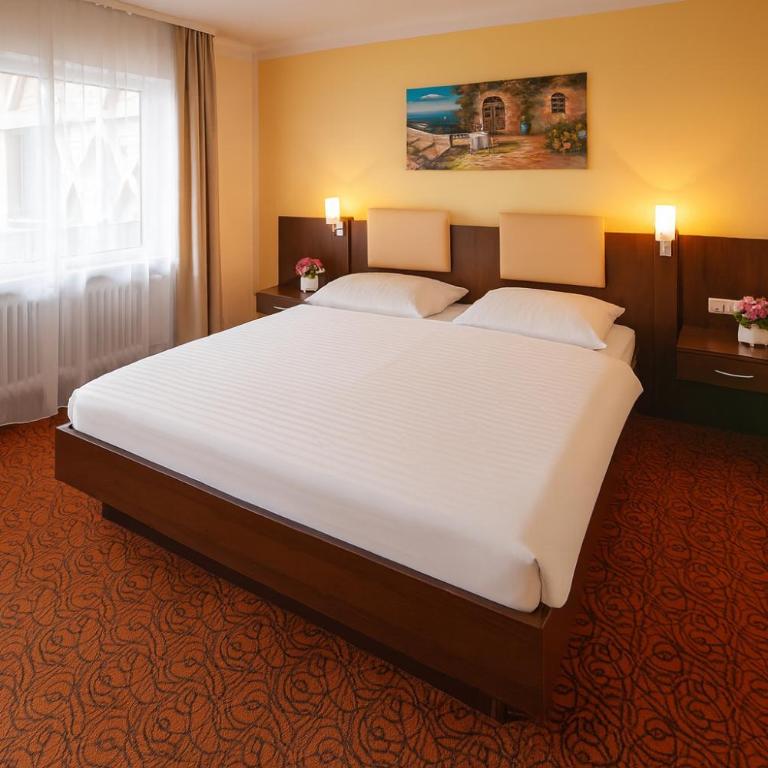 LuCA Hotel - Deluxe Doppelzimmer mit Balkon - 12