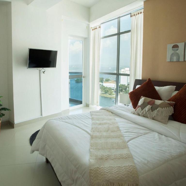 Un espacio sofisticado en medio de El Laguito Edificio Poseidon del Caribe - Apartamento de 2 dormitorios con balcón y vistas al mar - 9