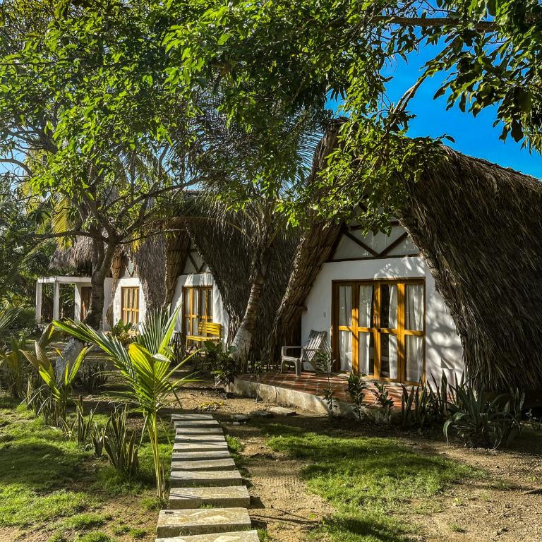 Casa Arrecife San Bernardo del Viento - Habitación con cama grande y bañera de hidromasaje - 2