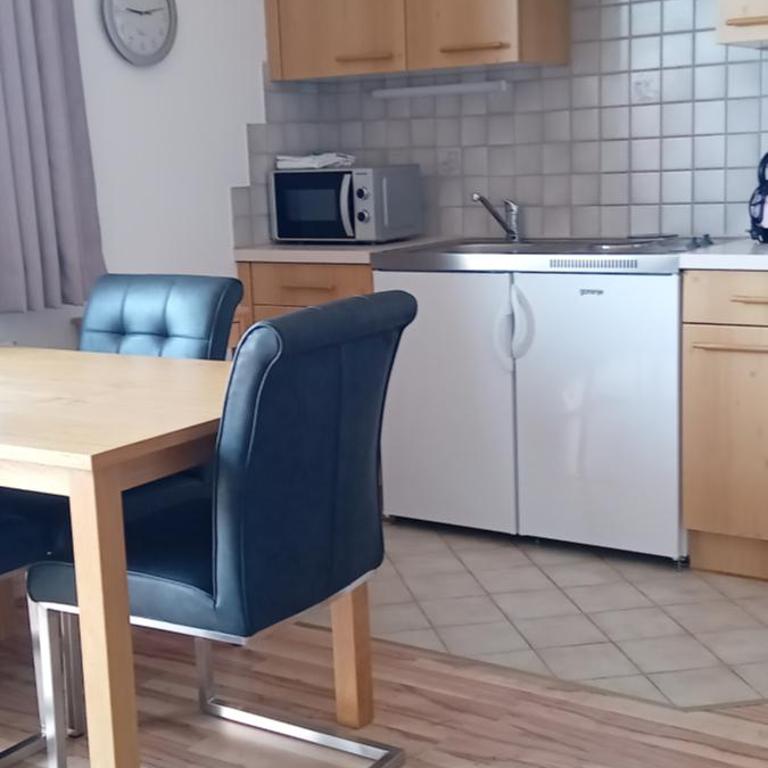 Gästehaus Tarmann - Apartment mit 1 Schlafzimmer und Seeblick - 13