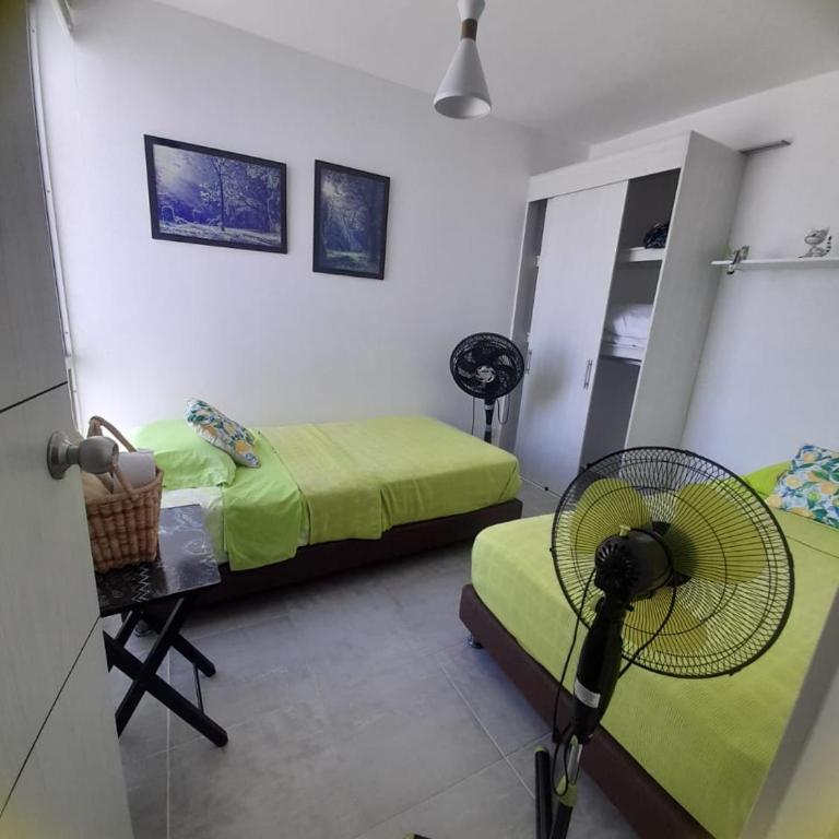 APARTAMENTO, LINDO,FRESCO,AIRE ACONDICONADO, PISCINA y Parqueadero VIA NARIÑO - Two-Bedroom Apartment with Mountain View - 11