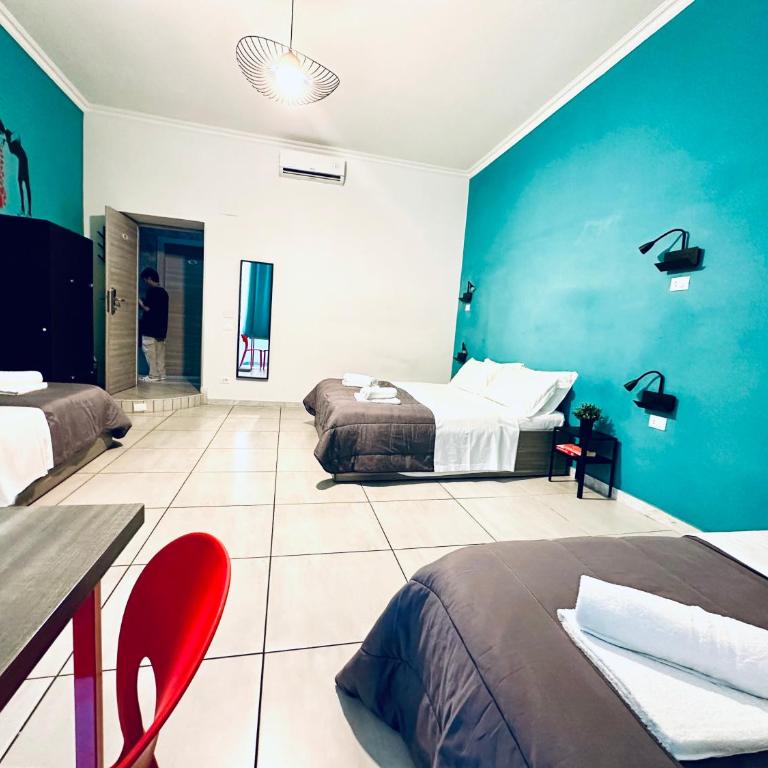 Jupiter Home - Camera Familiare con Bagno in Comune - 4