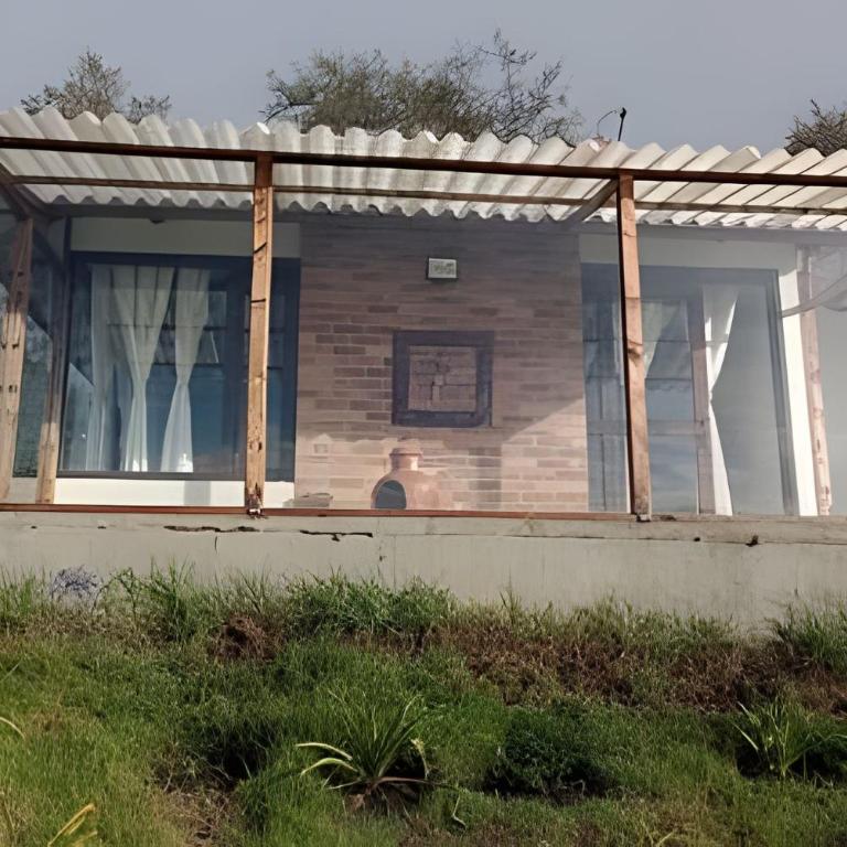 Casa de montaña con vista, BBQ y wifi confiable - Villa - 13