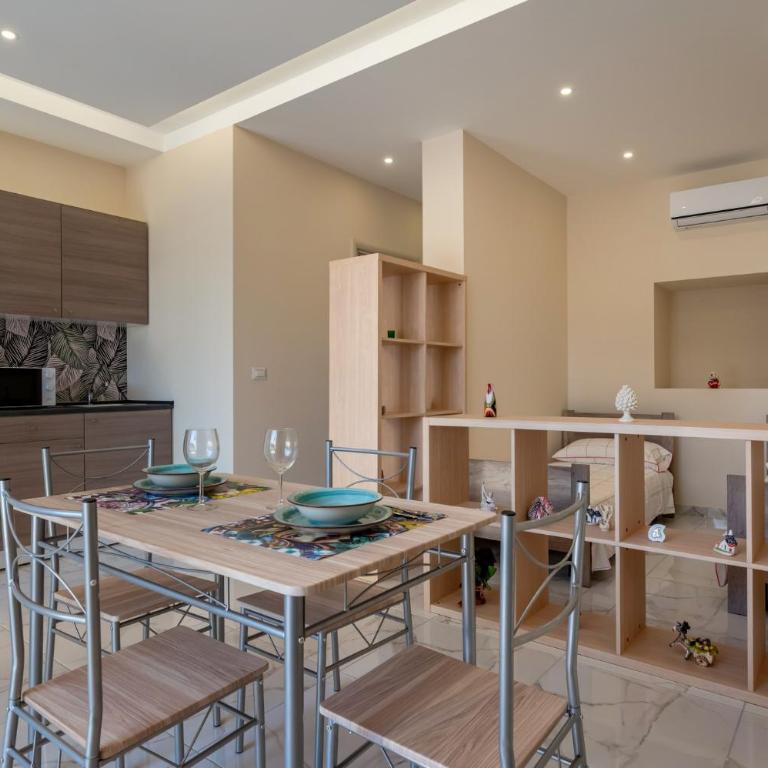 GuestHost - Isole Ciclopi View - Lovely Apartment - Appartamento con 1 Camera da Letto - 1