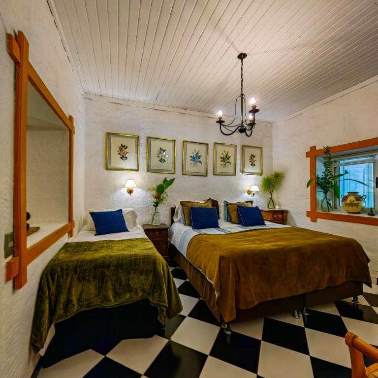 Boutique Hotel Parador Vendimia - Habitación Triple con vistas al jardín - 1