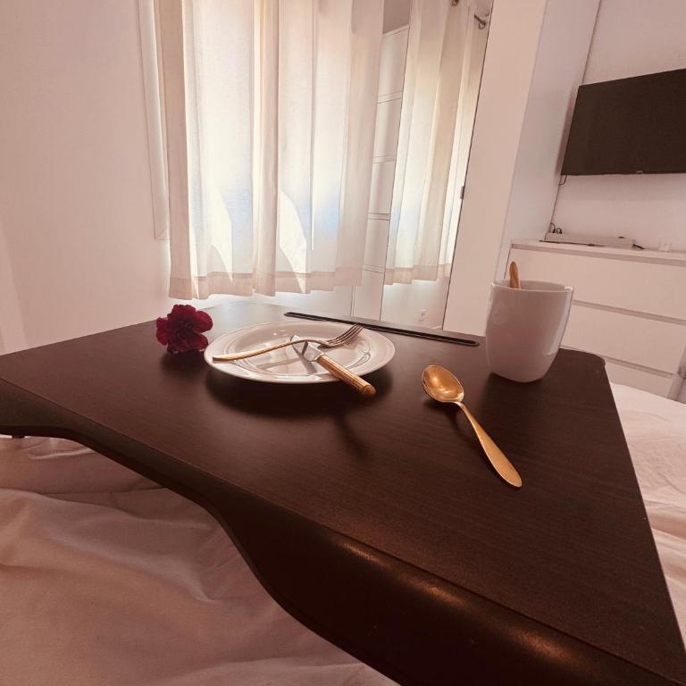 Rooftop Bernabeu Retreat - Two-Bedroom Apartment with Balcony and Terrace - 16