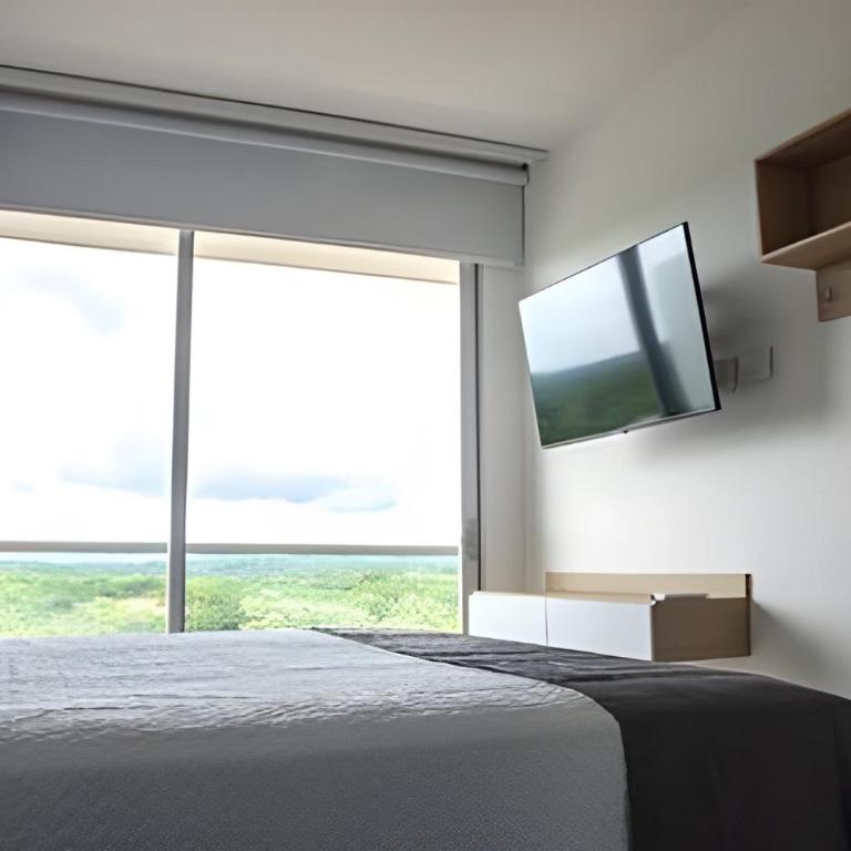 Elegancia y Comodidad en Baia Kristal - Apartamento Deluxe de 2 dormitorios con vistas al jardín - 1