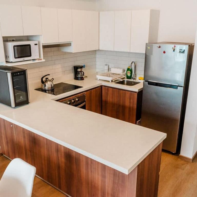 Bright 1BR with Gym and Chill Terrace - Apartamento - 9