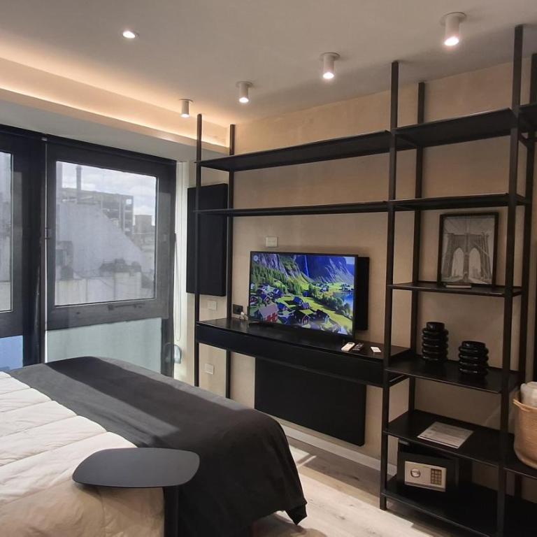 Comodidad y belleza, seguridad 24hs, céntrico, cochera, zona Galerías Pacífico y Obelisco - Apartamento de 1 dormitorio - 16