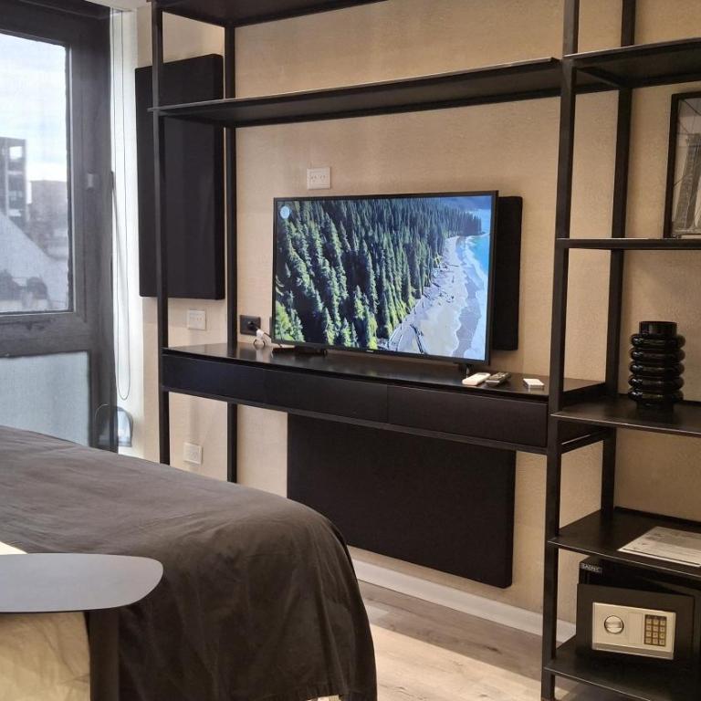 Comodidad y belleza, seguridad 24hs, céntrico, cochera, zona Galerías Pacífico y Obelisco - Apartamento de 1 dormitorio - 14