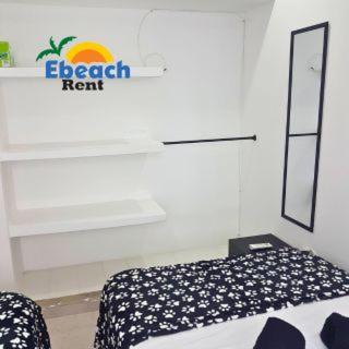 Ebeach Apartamento con aire, cocina y TV, a pasos de la playa - Two-Bedroom Apartment - 18