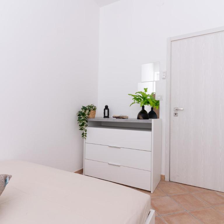 Appartamento Deluxe Eclissi sul MARE 30mt dal mare - Four-Bedroom Deluxe Apartment - 18