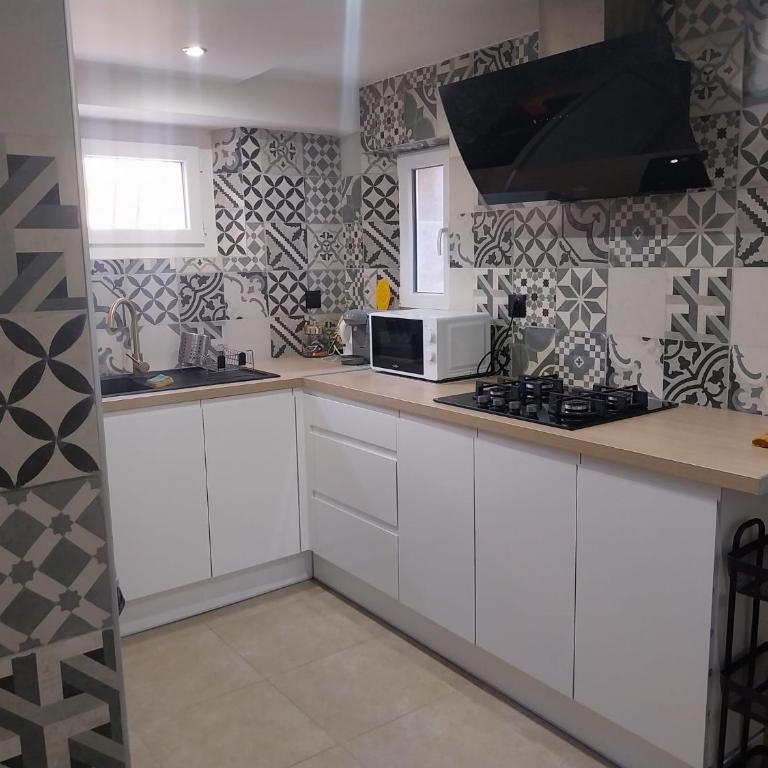 Maison rez de chaussée avec un espace jardin, bien située - Maison 1 Chambre - 14