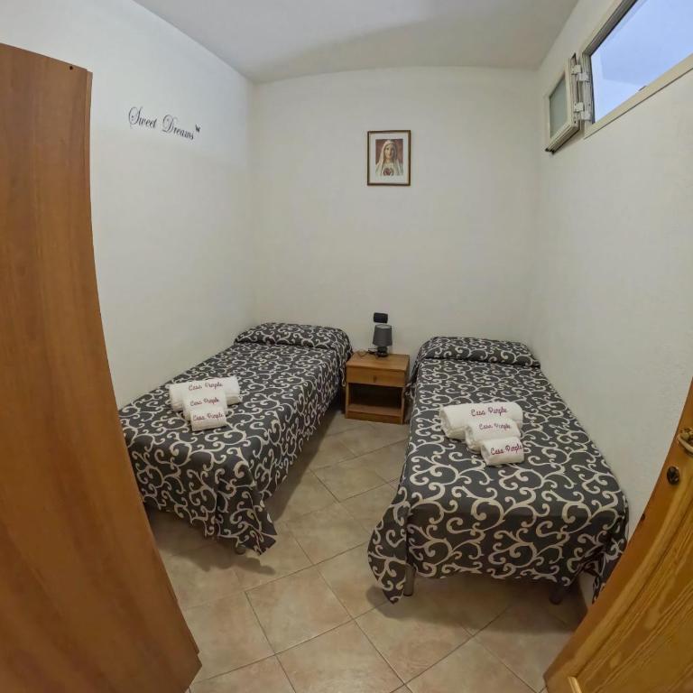 Casa Purple - Appartamento con 2 Camere da Letto e Vista Giardino - 15