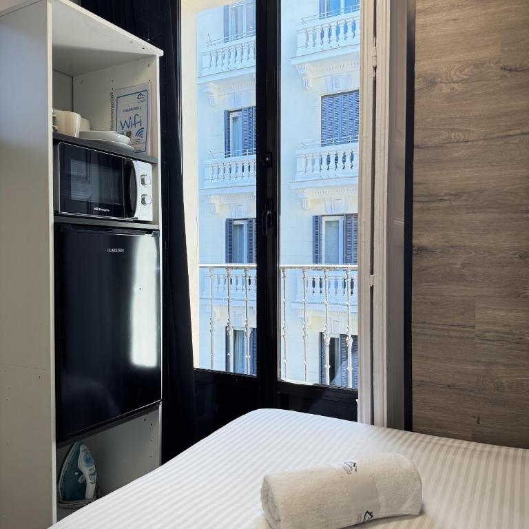 Apartamentos Day Madrid GRAN VIA I - Habitación Individual Económica - 5