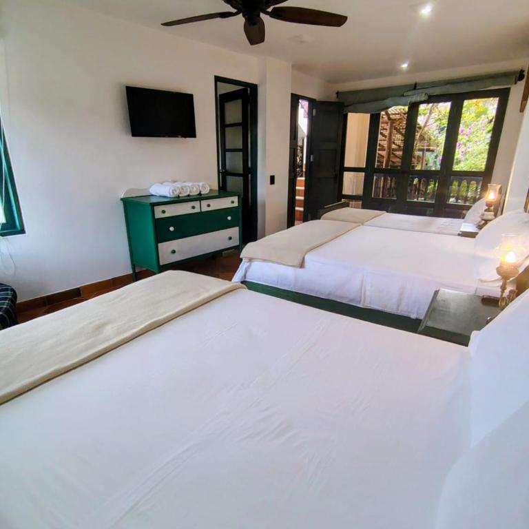 Casa Silva - Hotel Cafe - Habitación Familiar con vistas al jardín - 6