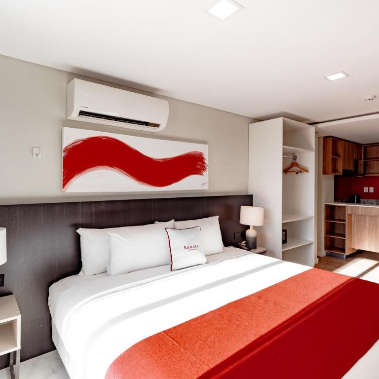 Ramada Suites by Wyndham Asuncion Aeropuerto - Superior Room with One King Bed and One Single Bed - Non-Smoking - 2