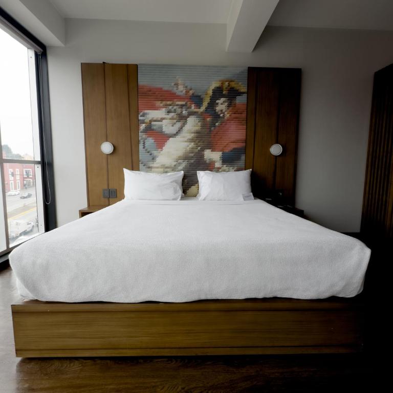 Ikonik Hotel Puebla - Habitación Deluxe con cama extragrande - 4