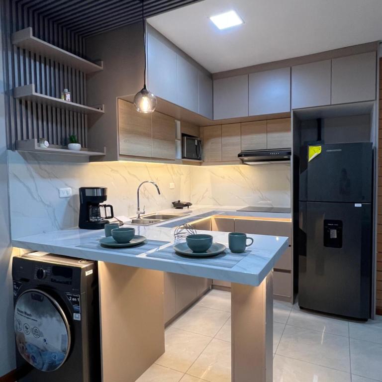 Suit Central, cómoda y minimalista perfecta para tu estadía - One-Bedroom Apartment - 9