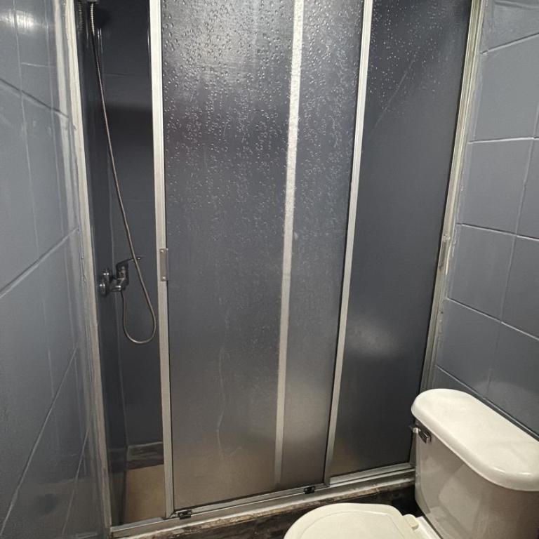 Residencial Don Santiago - Habitación con cama grande - 9