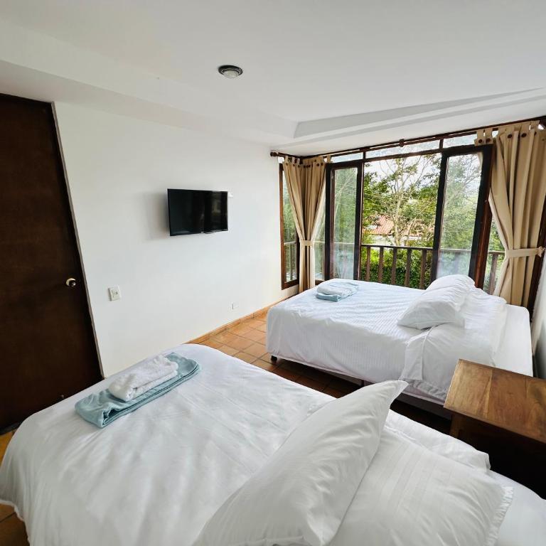 Bruma-Casa familiar cerca a la Plaza Ppal - Two-Bedroom House - 2